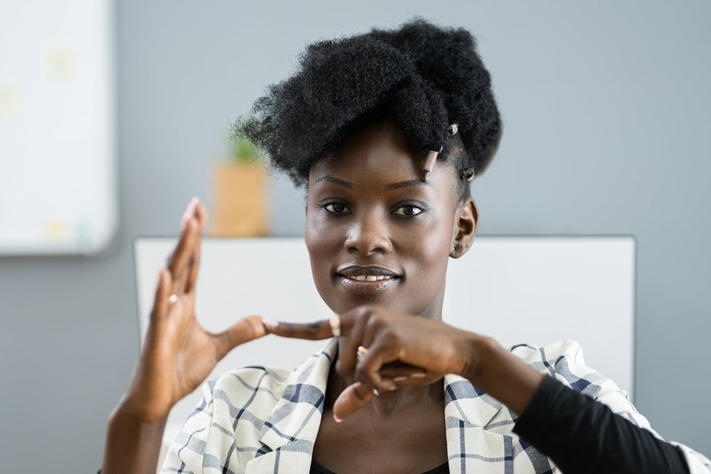 [Kenya] Early November salaries for TSC teachers - teacher demonstrating sign language, TSC teachers paid early Kenya
