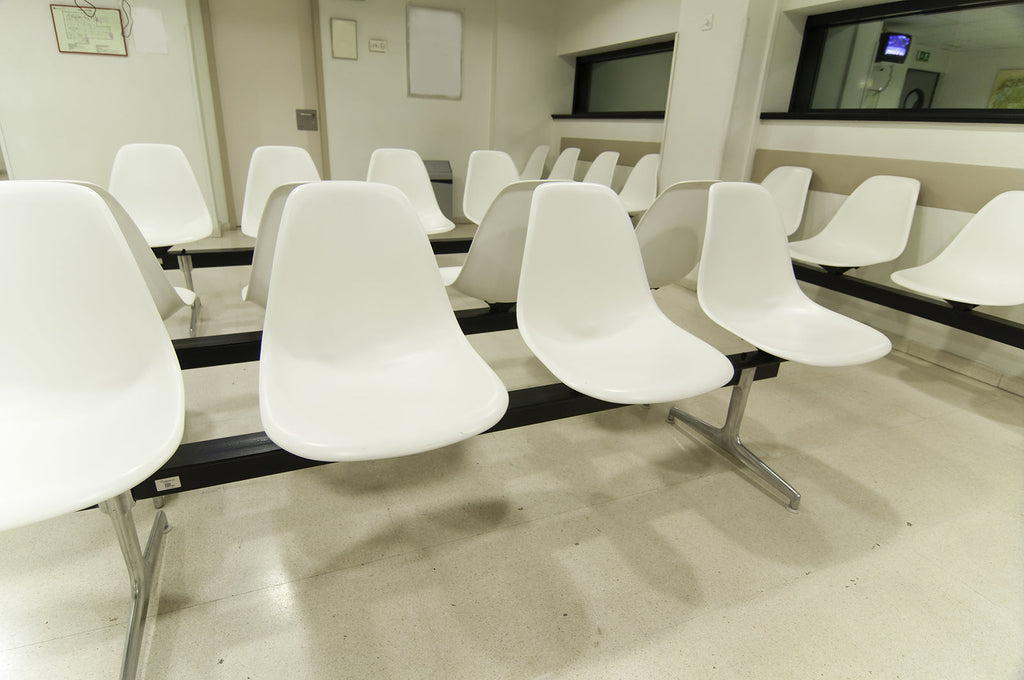 [South Africa] Gauteng Department of Health freezes 66 unverified workers’ salaries - hospital waiting room with rows of white chairs, ghost worker salaries frozen in Gauteng