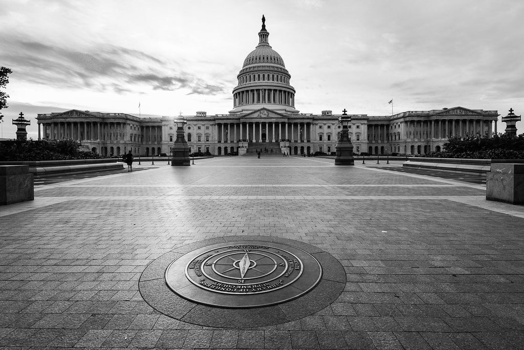 [US] New Presidential Actions Likely Affecting Payroll - Capitol Building grounds and compass in black and white, Trump's imapct on Payroll