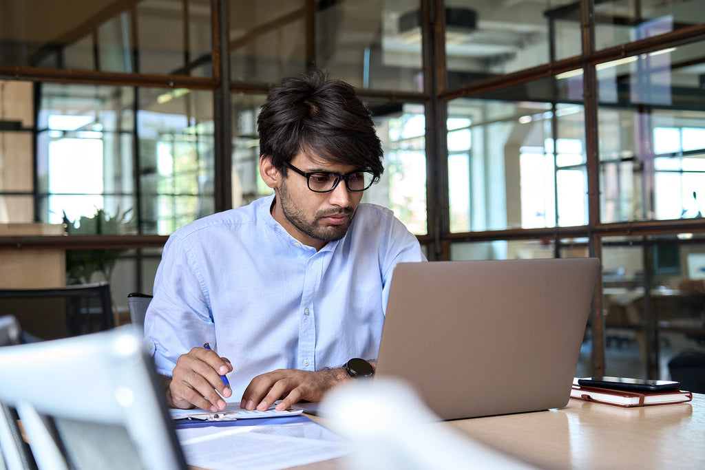 [India] Employment rising but salaries failing to keep pace with inflation - young Indian worker doing workplace training, Indian salaries falling behind inflation